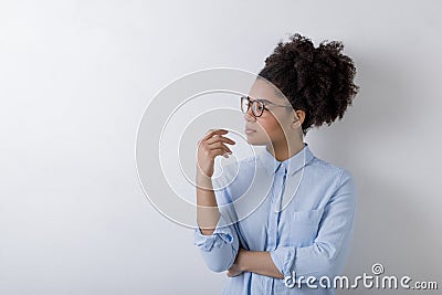 Business woman deep in thought looking away Stock Photo