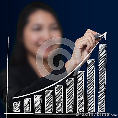 Business woman drawing growthing arrow Stock Photo