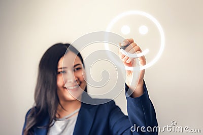 Business Woman Drawing Satisfaction Happy Symbol for Customer Feedback on Touch Screen., Businesswoman Draw Media Survey Icon or Stock Photo