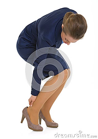 Business woman experiencing pain from shoes Stock Photo