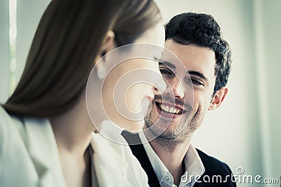 Business woman falling in love with boss at work Stock Photo