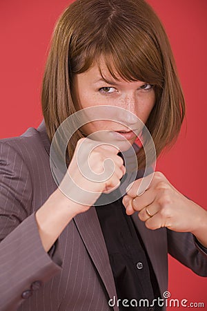 Business woman in fighting stance Stock Photo