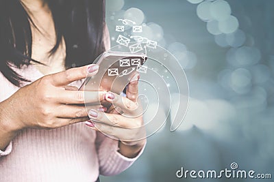 Business woman hand sending email by smart phone Stock Photo