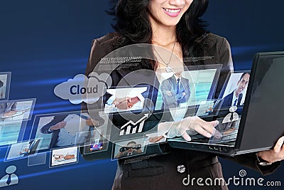 Business woman in hightech concept working with laptop Stock Photo