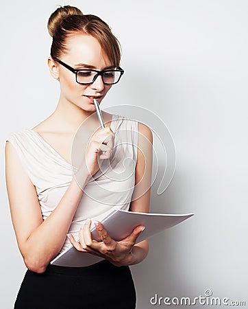 Business woman hold pages of paper Stock Photo