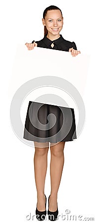 Business woman holding a blank white board. Stock Photo