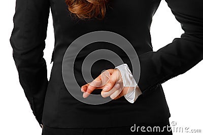Business woman holding crossed fingers behind back Stock Photo
