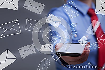 Business woman holding smartphone sending mail Stock Photo
