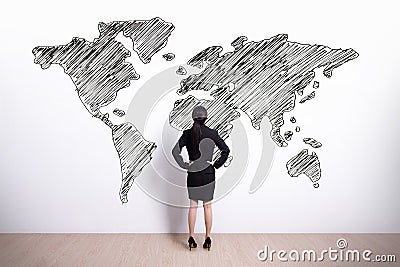 Business woman look world map Stock Photo