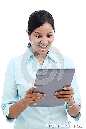 Business woman looking at touch pad PC Stock Photo