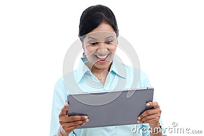 Business woman looking at touch pad PC Stock Photo