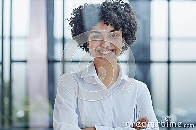 business woman looks admiringly into the distance through the glass Stock Photo