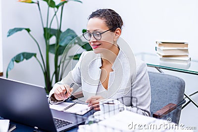 Business woman making video conference call Stock Photo