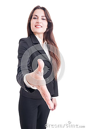 Business woman offering handshake with selective focus on hand Stock Photo