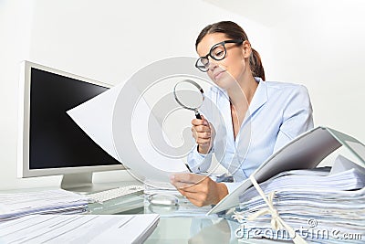 Business woman in office check documents and contracts with mag Stock Photo