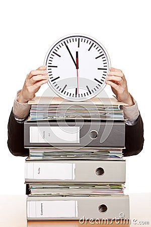 Business woman in office has time pressure Stock Photo