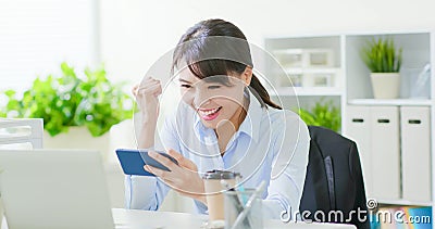 Business woman play mobile game Stock Photo