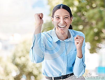 Business woman portrait, fist cheering and success, winning and bonus achievement in city outdoors. Happy, lucky smile Stock Photo