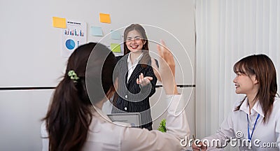 Business woman presentation and female employee ask question during work training, motivated confident female employee Stock Photo