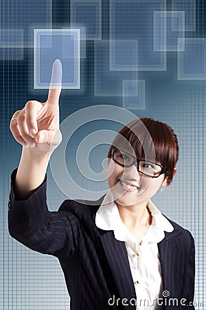 Business woman pressing a touchscreen Stock Photo