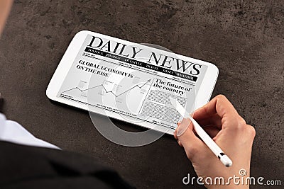 Business woman reading news Stock Photo