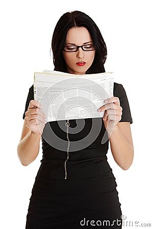 Business woman reading a newspaper Stock Photo