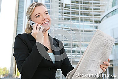 Business Woman Reading Newspaper Stock Photo