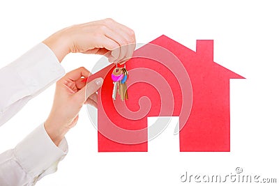 Business woman real estate agent holding red paper house keys Stock Photo