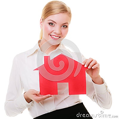 Business woman real estate agent holding red paper house. Stock Photo