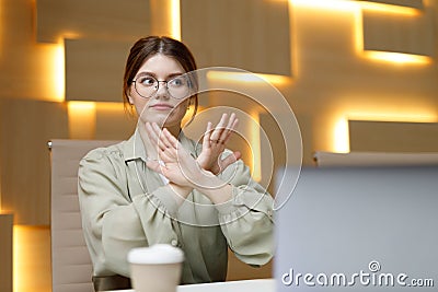 Business woman showing denial sign, no deal. Disagreement of the office worker Stock Photo
