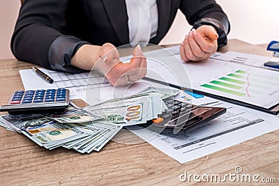 Business woman showing how much money Stock Photo