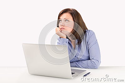 Business woman is sitting in front of a laptop Stock Photo