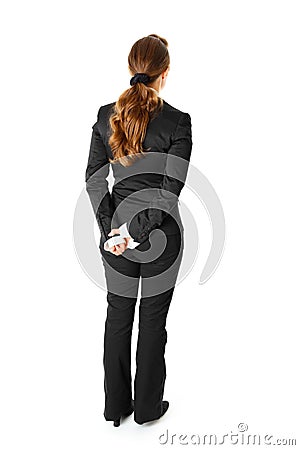 Business woman standing with her back to camera Stock Photo
