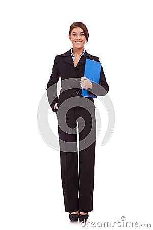 Business woman standing with her clipboard Stock Photo