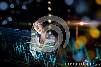 Business woman, tablet and dashboard at night of stock market, trading or graph and chart data at office. Female trader Stock Photo