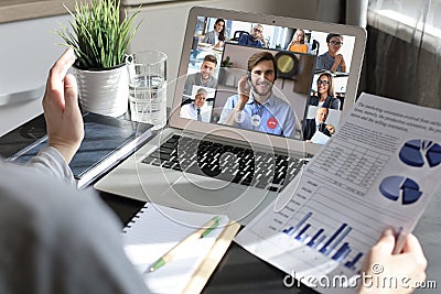 Business woman talking to her colleagues in video conference. Business team working from home using laptop Stock Photo