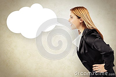 Business woman telling a message in a speech balloon Stock Photo