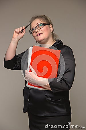 Business woman in thick glasses with coffee, documents and notepads and leather wallet in hand Stock Photo