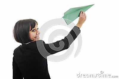 Business woman throwing paper airplane Stock Photo