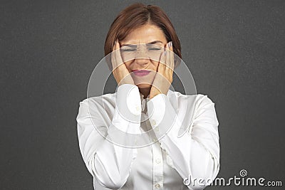 business woman is tired and worried in emotions. Stress and headache. Working shocks Stock Photo