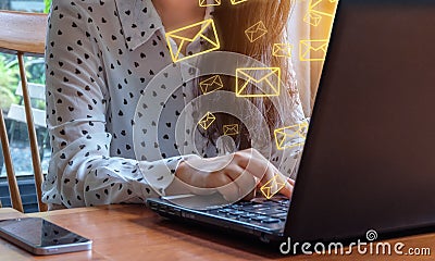 Business woman use tablet with email icons in work space. Stock Photo