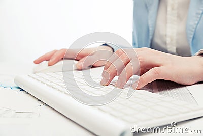 Business woman using computer mouse and keyboard Stock Photo