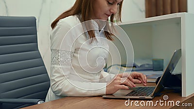 Business woman using laptop computer at desk, female hands typing on notebook keyboard studying working, close up view. 4k video stock video footage Business woman using laptop computer at desk, female hands typing on notebook keyboard studying working, close up view. 4k video stock video footage