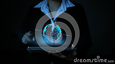 Business woman using a tablet computer, with hologram futuristic globe sphere Stock Photo