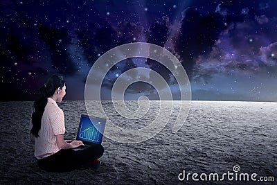 Business woman working on outer space Stock Photo