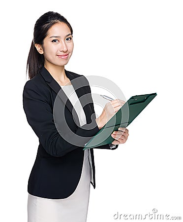 Business woman write down on clipboard Stock Photo