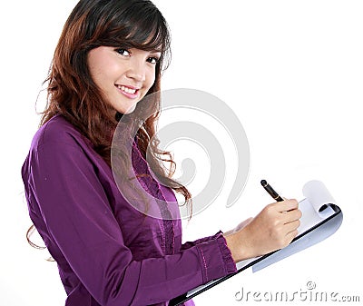 Business woman writing on document Stock Photo