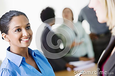 Business Women Communicating With Each Other Stock Photo