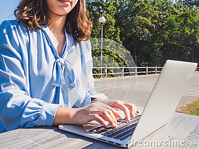 Business women hand used laptop on the road background for online searching Stock Photo