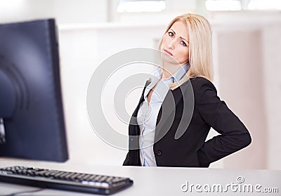 Business women having back pain Stock Photo